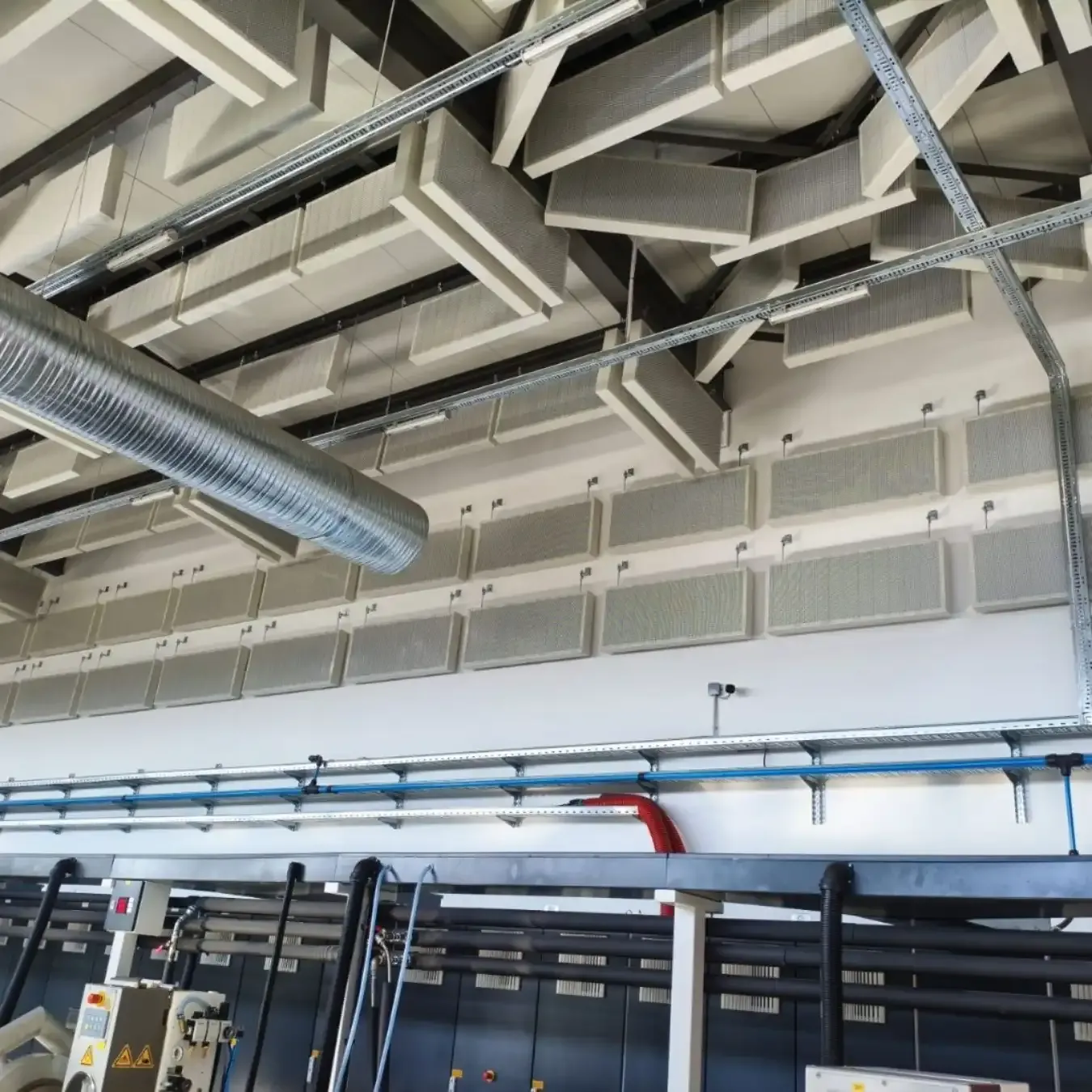 Acoustic Treatment of an Industrial Hall for Excellpack