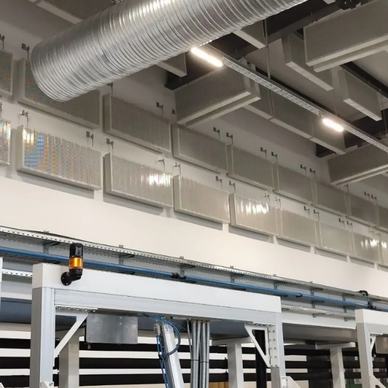 Acoustic Treatment of an Industrial Hall for Excellpack