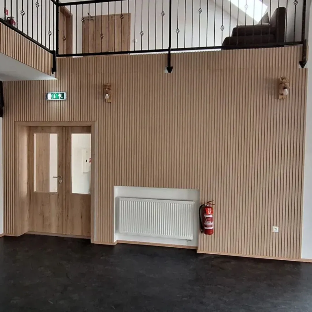 Echo Reduction in a Ballroom with Echo Cloud and Wood Slat Panels