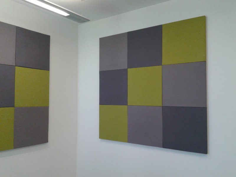 Acoustic panels in a glass-wall office