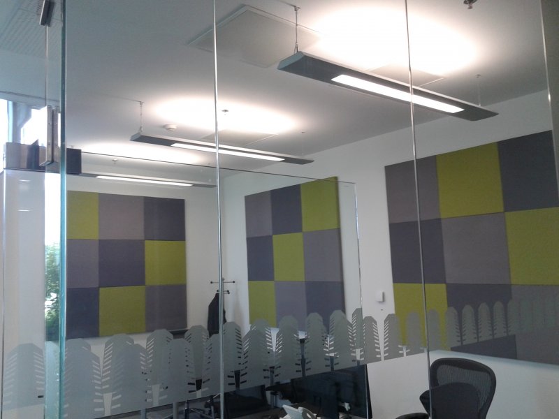Acoustic panels in a glass-wall office